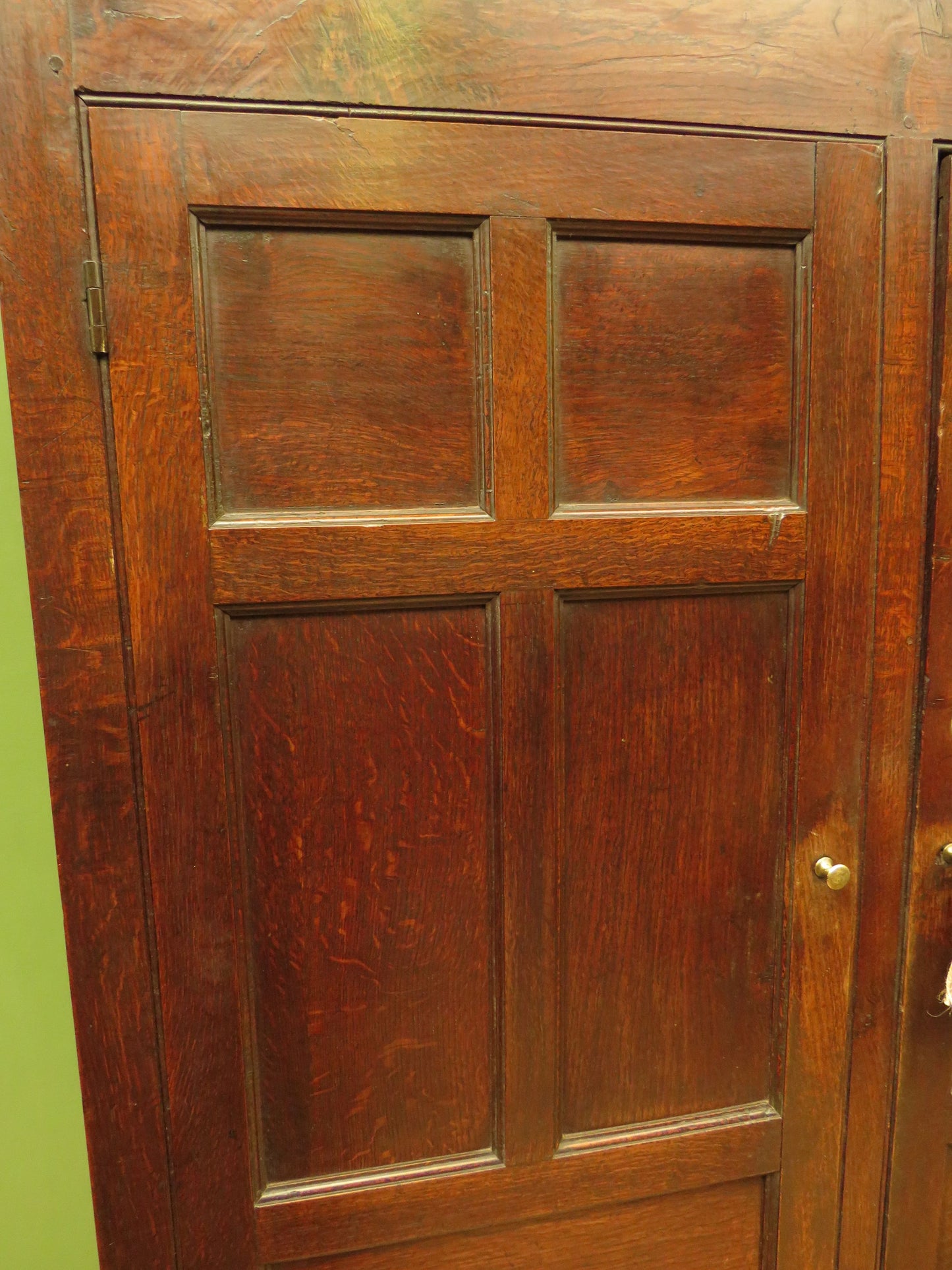 Antique two part Welsh oak linen press with richly aged finish