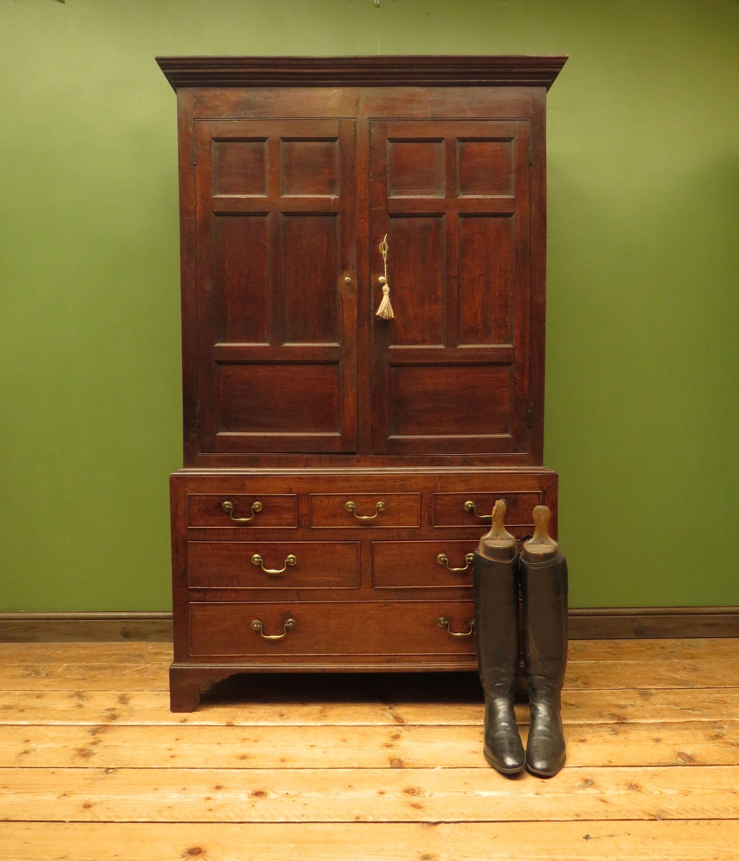Antique two part Welsh oak linen press with richly aged finish