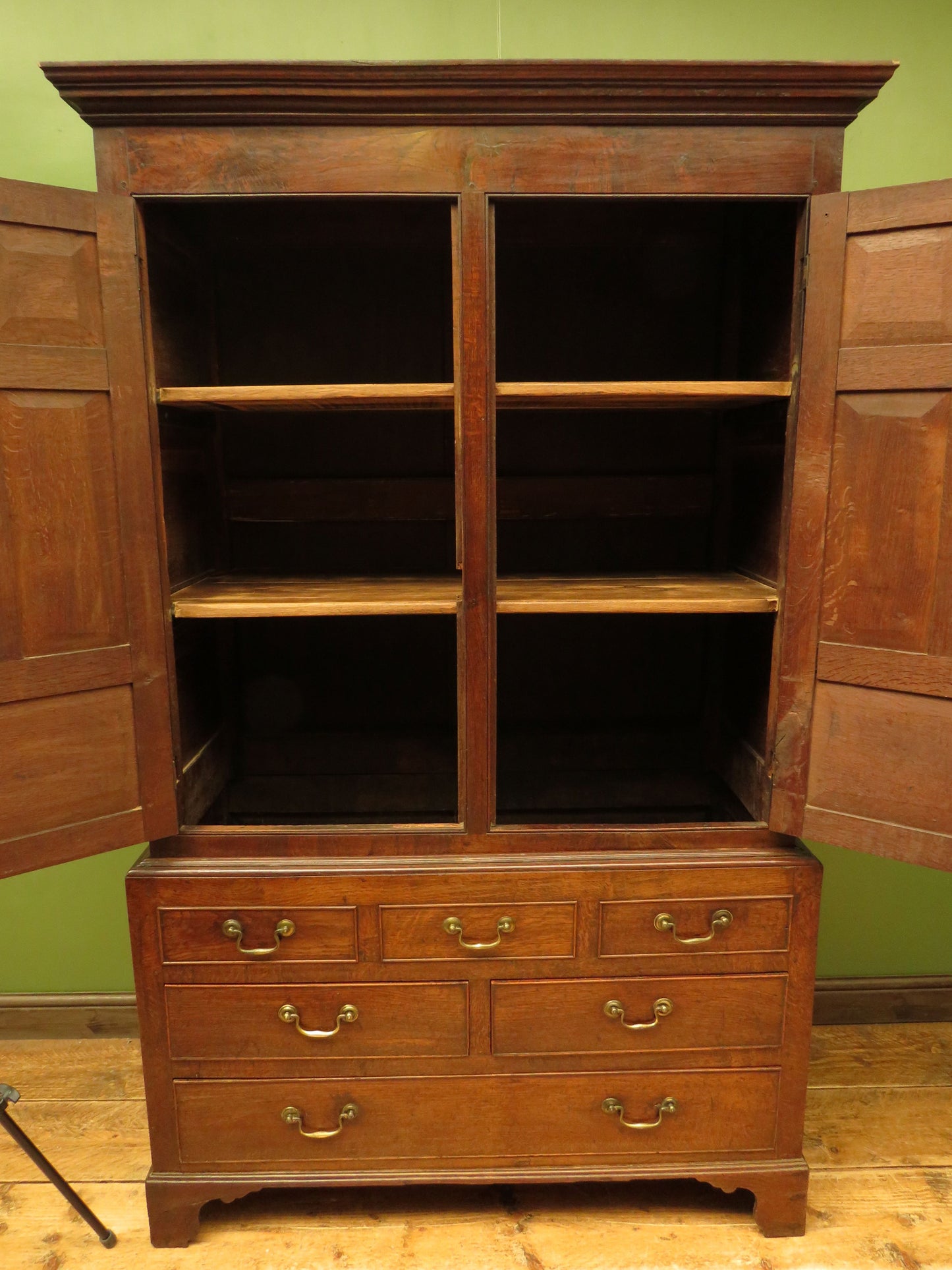 Antique two part Welsh oak linen press with richly aged finish