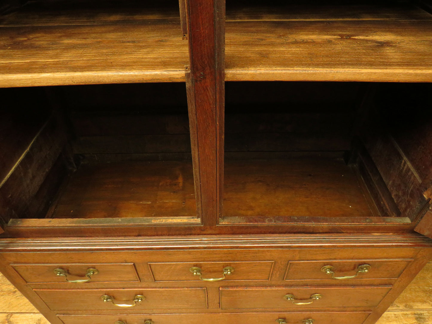 Antique two part Welsh oak linen press with richly aged finish