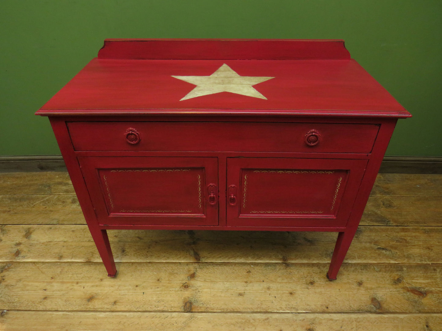 Circus Themed painted red Washstand Cabinet with star to top