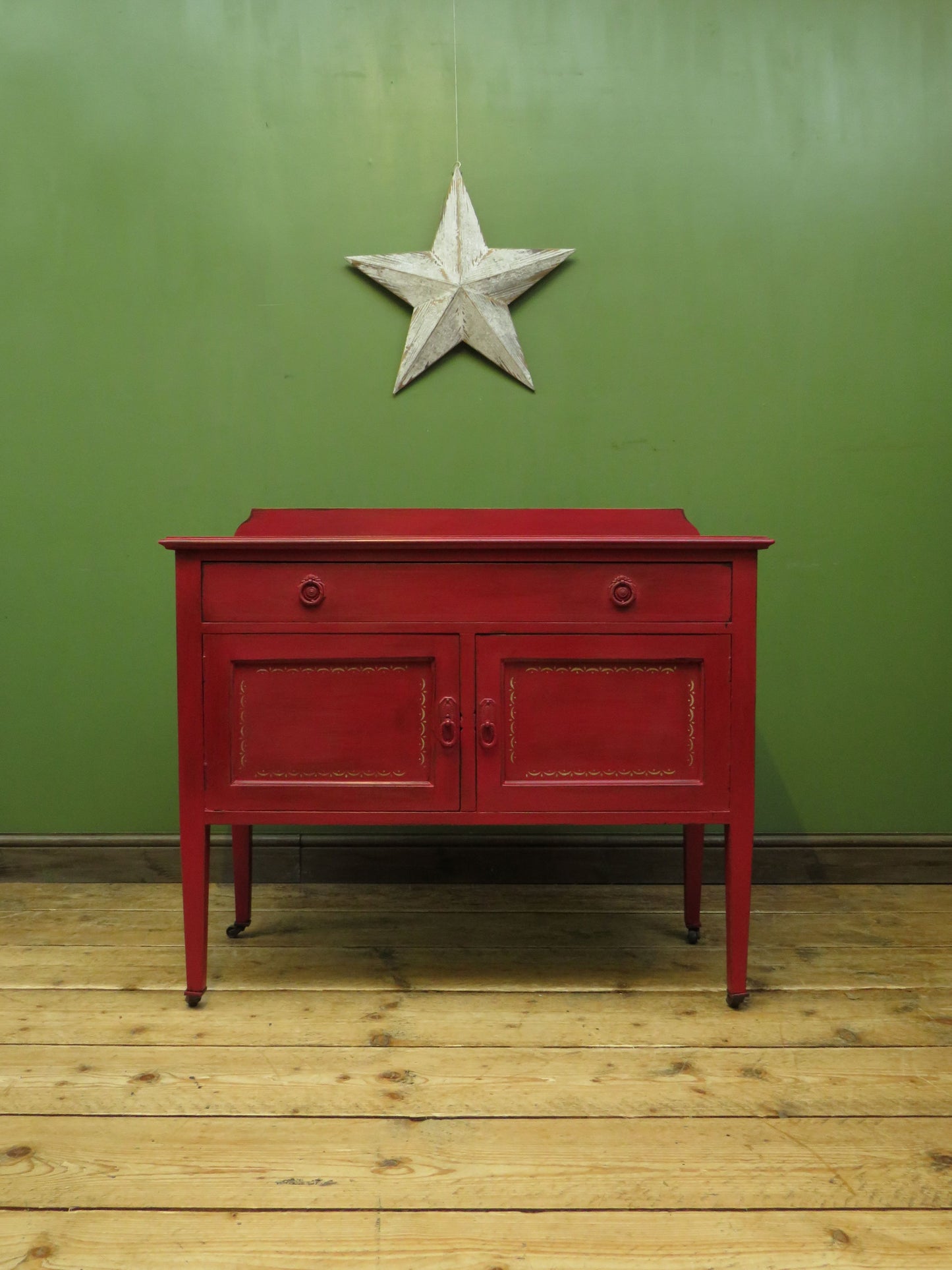 Circus Themed painted red Washstand Cabinet with star to top