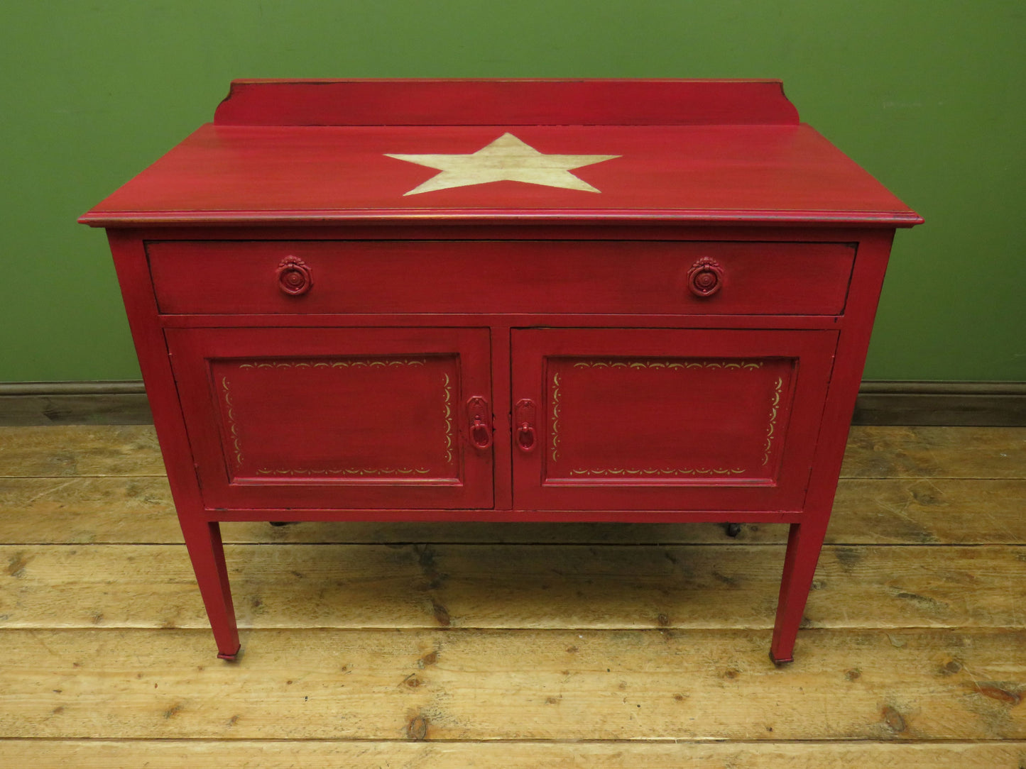 Circus Themed painted red Washstand Cabinet with star to top