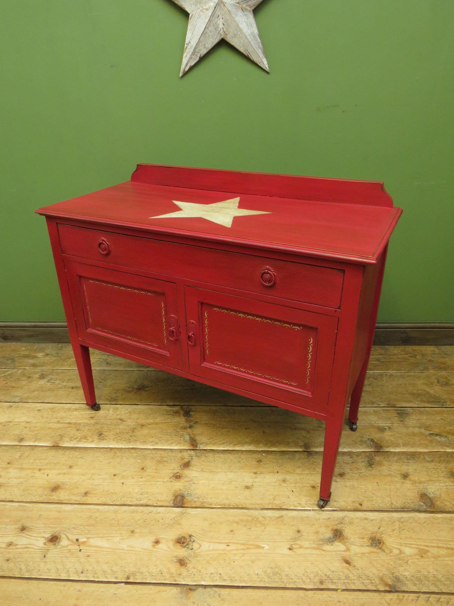 Circus Themed painted red Washstand Cabinet with star to top