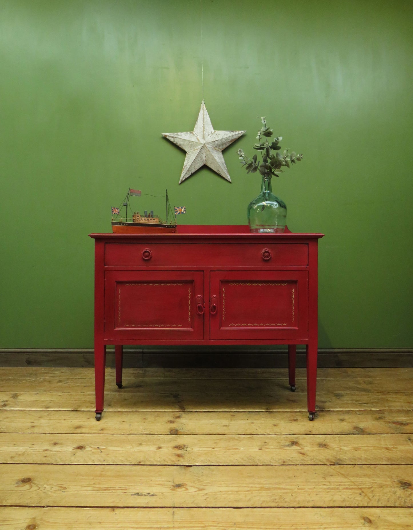 Circus Themed painted red Washstand Cabinet with star to top