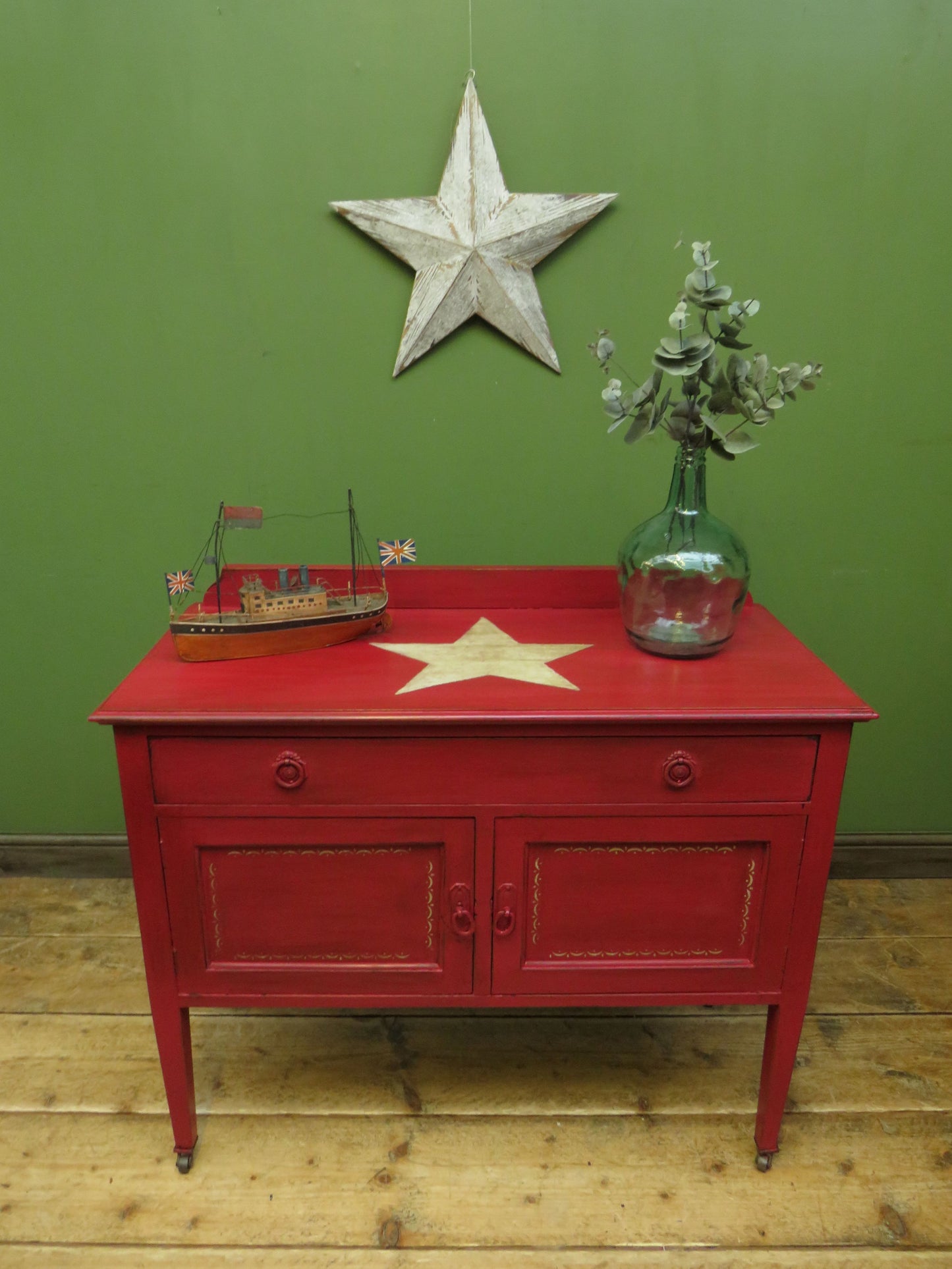 Circus Themed painted red Washstand Cabinet with star to top