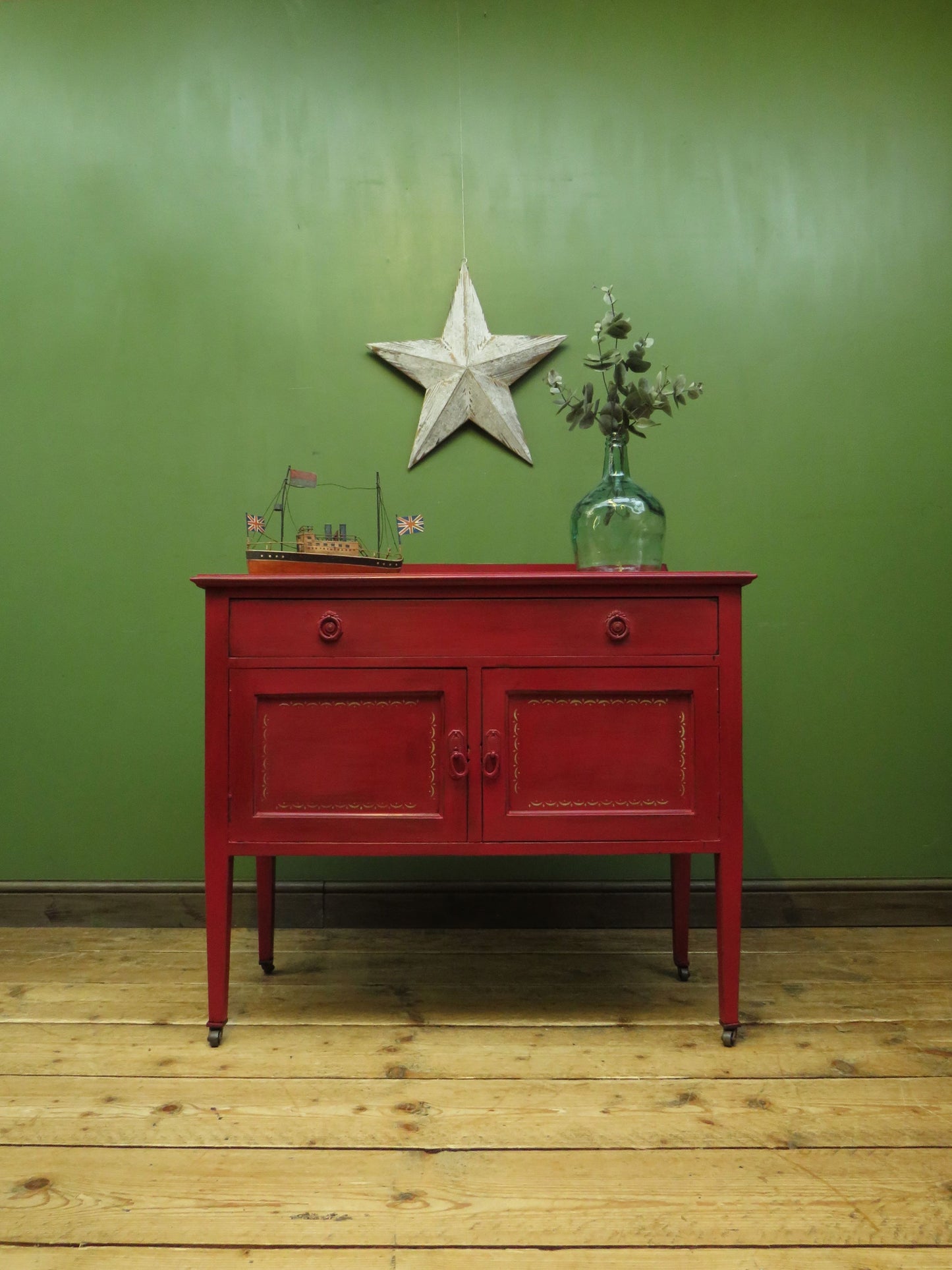 Circus Themed painted red Washstand Cabinet with star to top