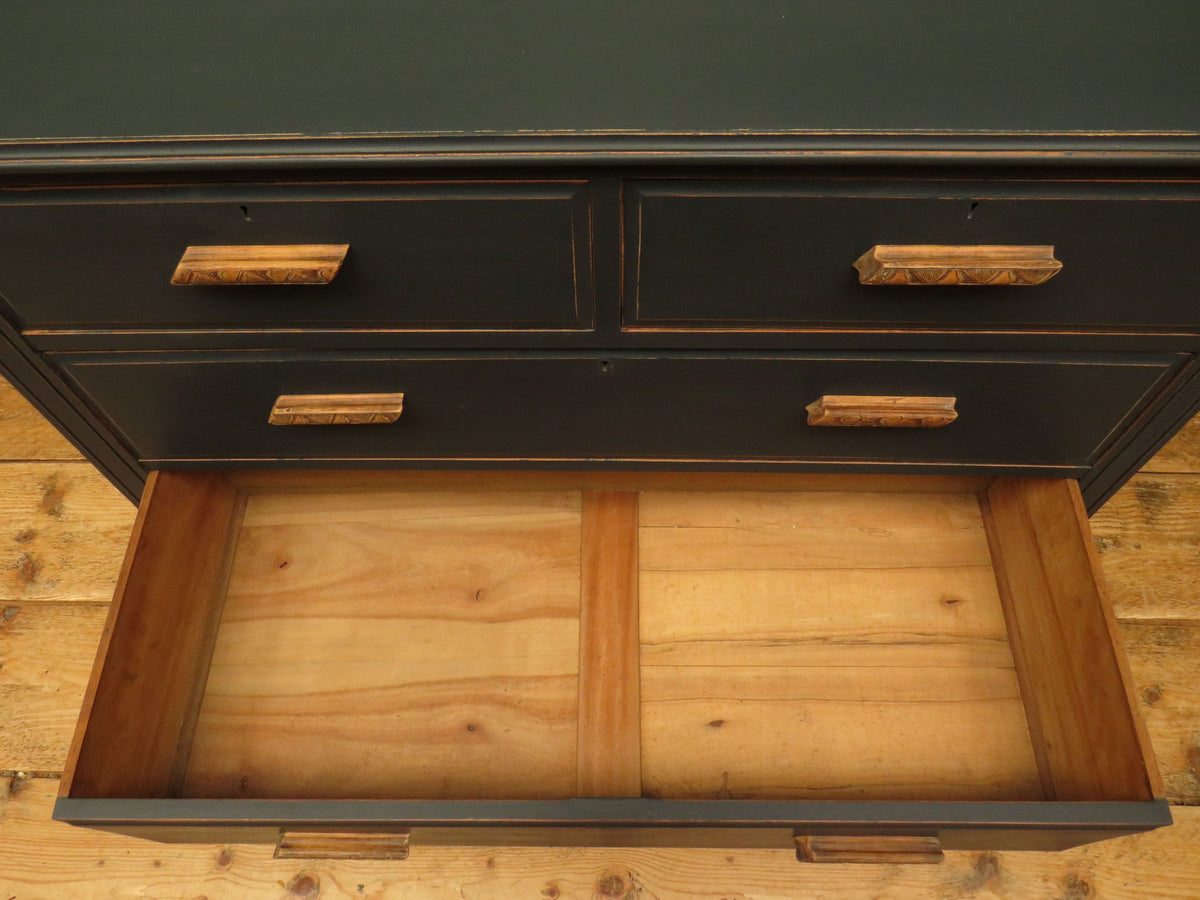 Art Deco Painted Black Chest of Drawers with stylised wooden handles