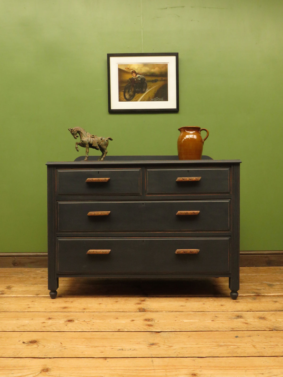 Art Deco Painted Black Chest of Drawers with stylised wooden handles