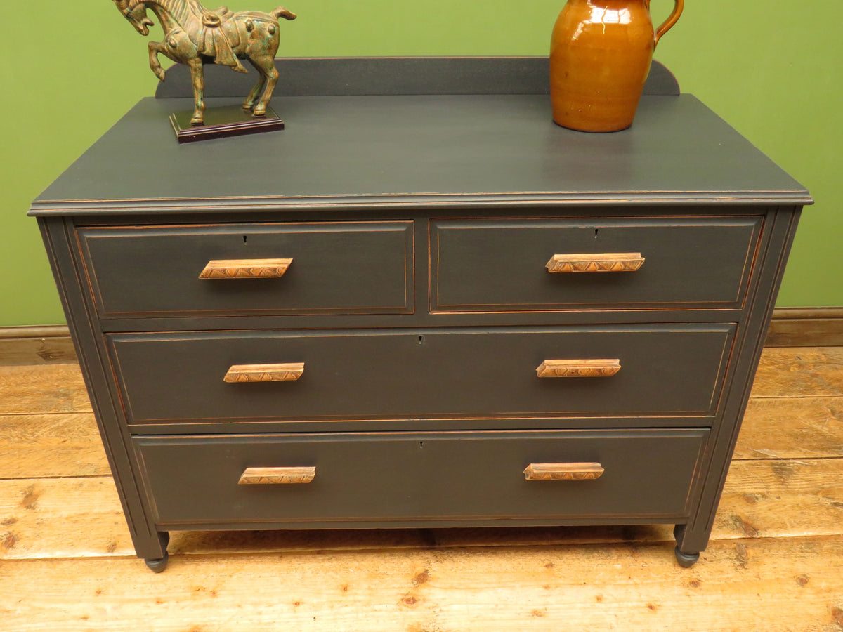 Art Deco Painted Black Chest of Drawers with stylised wooden handles