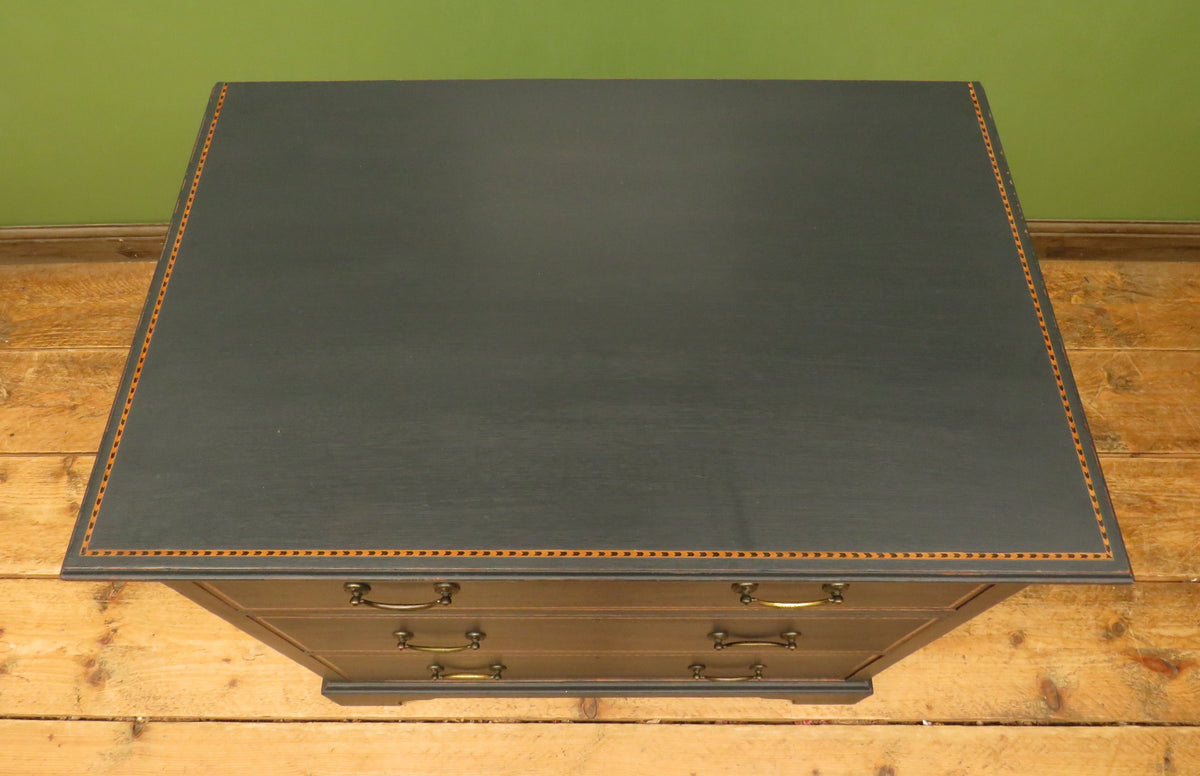 Black Painted Chest of Drawers with Intricate Inlaid Detailing