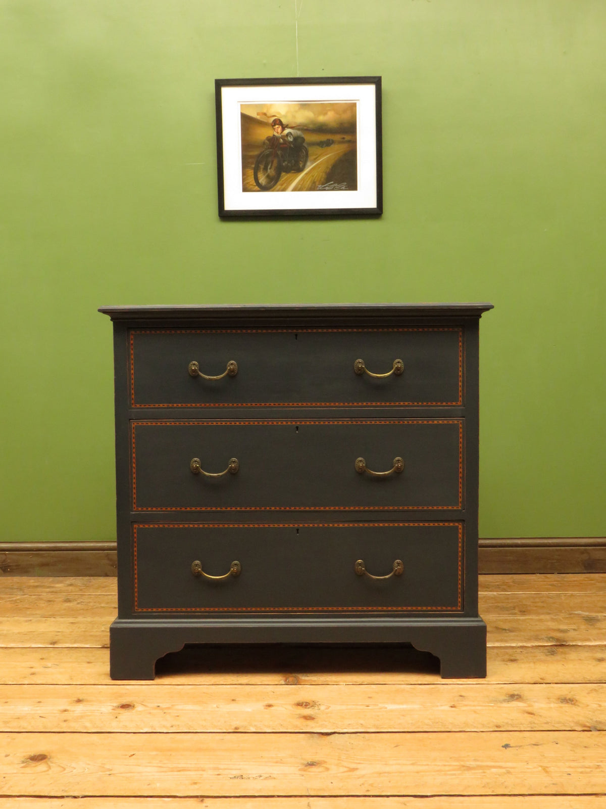 Black Painted Chest of Drawers with Intricate Inlaid Detailing