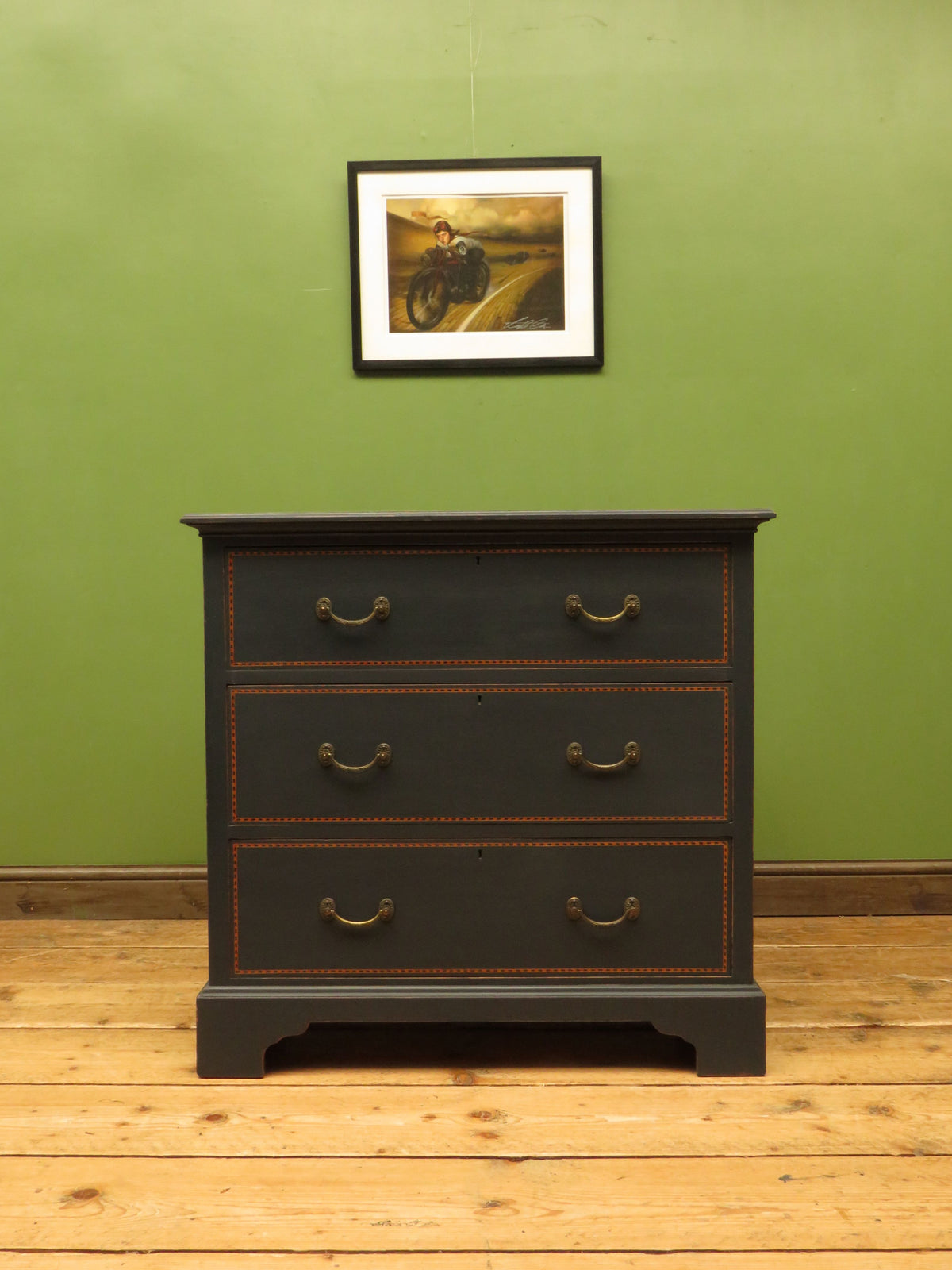 Black Painted Chest of Drawers with Intricate Inlaid Detailing