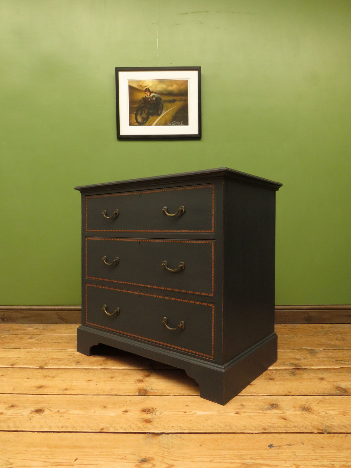 Black Painted Chest of Drawers with Intricate Inlaid Detailing
