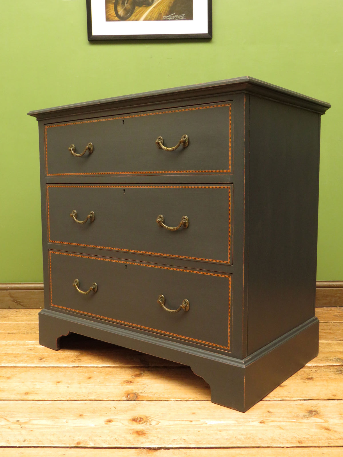 Black Painted Chest of Drawers with Intricate Inlaid Detailing