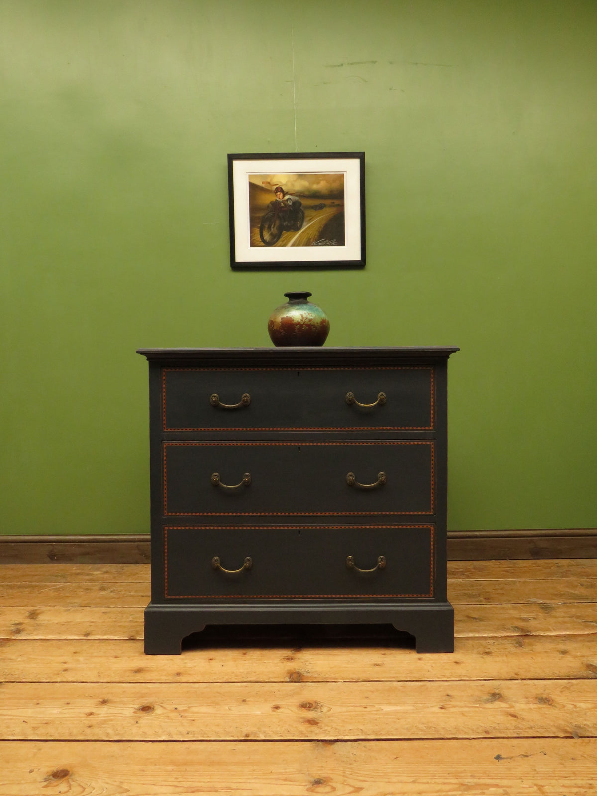 Black Painted Chest of Drawers with Intricate Inlaid Detailing