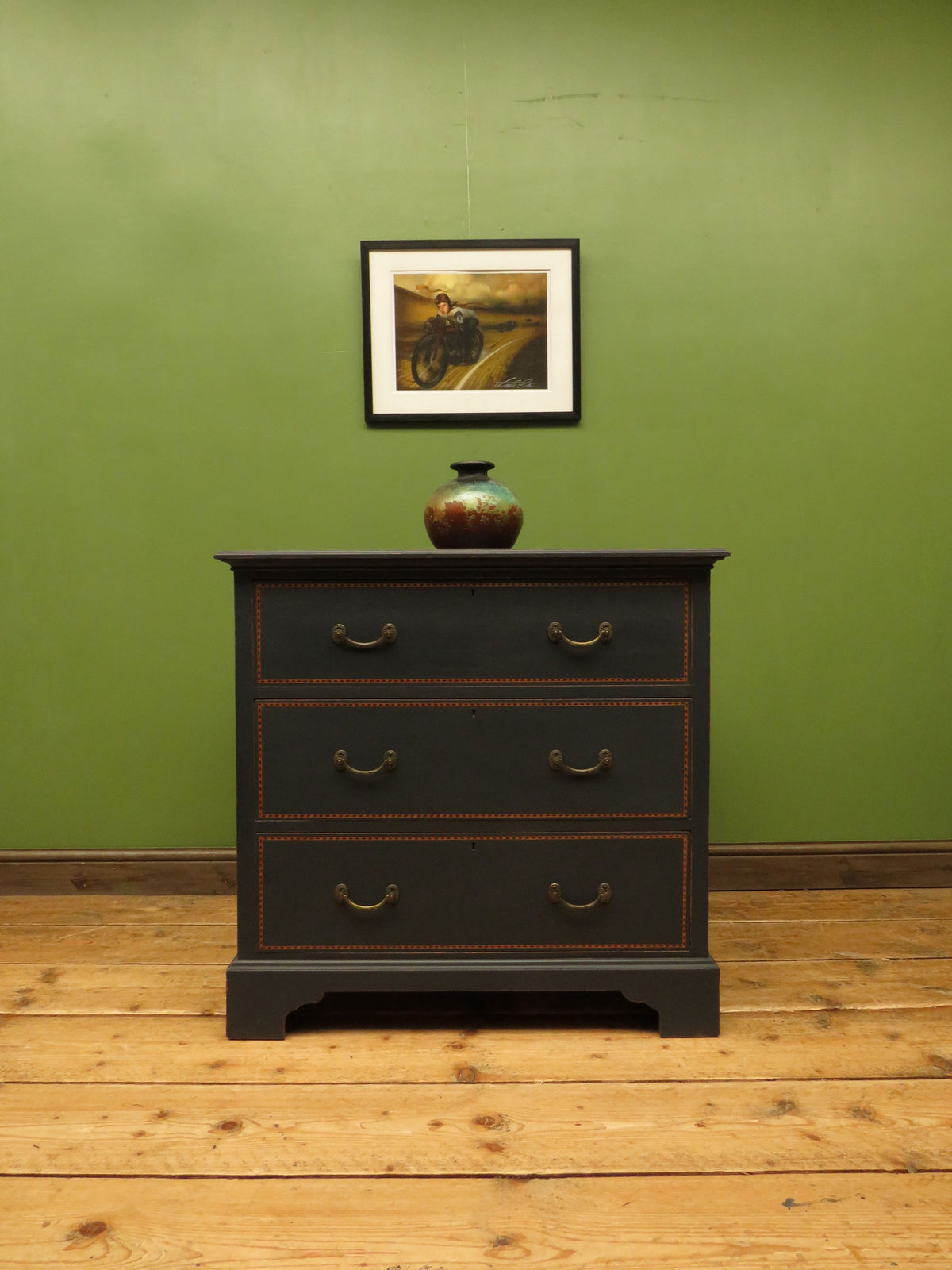 Black Painted Chest of Drawers with Intricate Inlaid Detailing